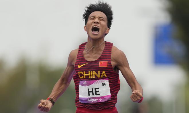 Kinesen He Jien fråntas sin guldmedalj i Peking halvmaraton. Arkivbild.