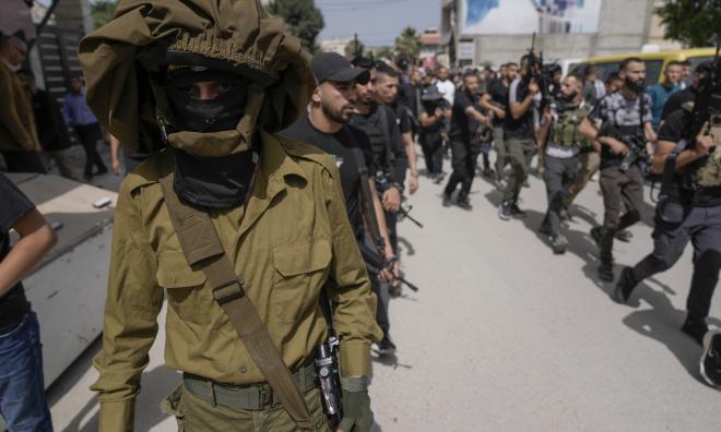 Palestinier tillhörande extremistgruppen Islamiska jihad under en begravning i Jenin den 18 maj.