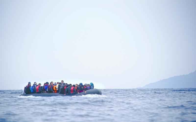 Refugees on a boat crossing the Mediterranean sea, heading from Turkish coast to the northeastern Greek island of Lesbos,  29 January 2016.